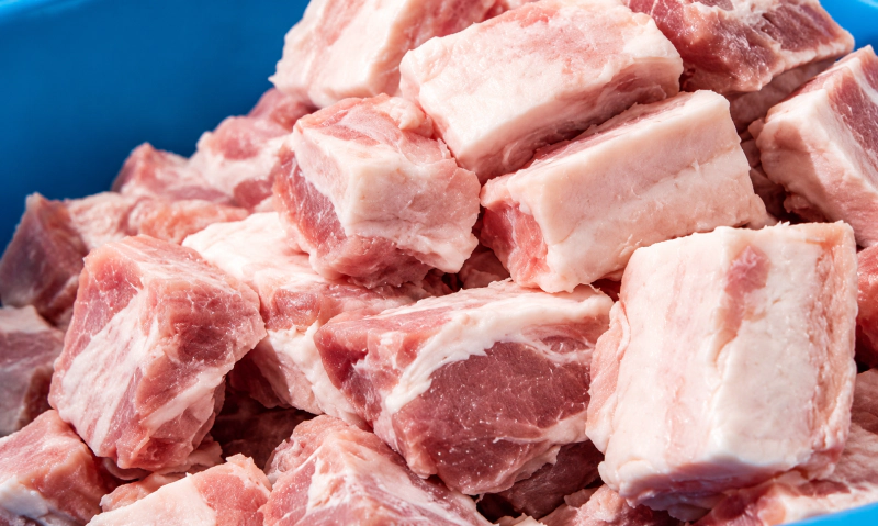 Meat preparation stage in a sausage processing line